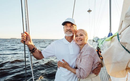 elderly couple on a yacht